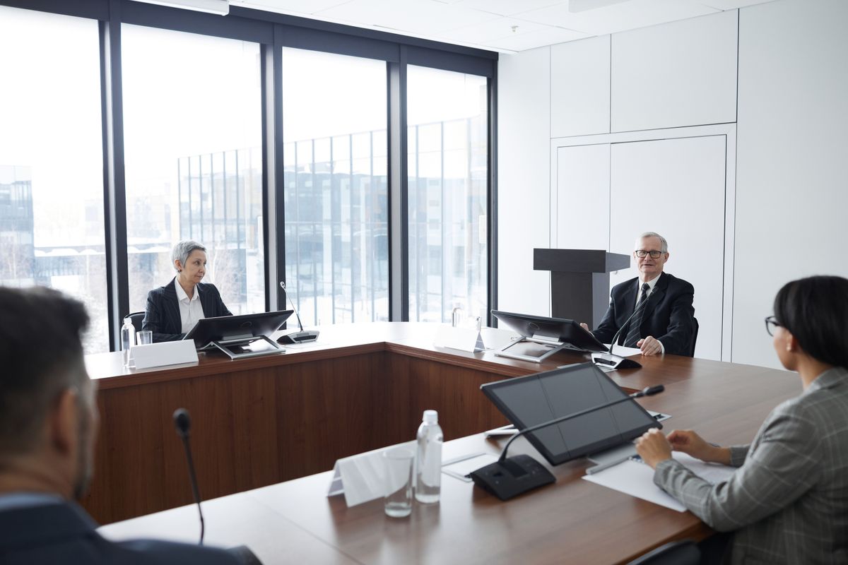 Senior leaders in session in a modern boardroom